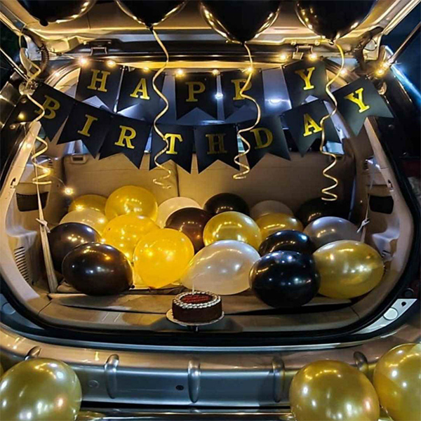 Black and gold themed car trunk surprise